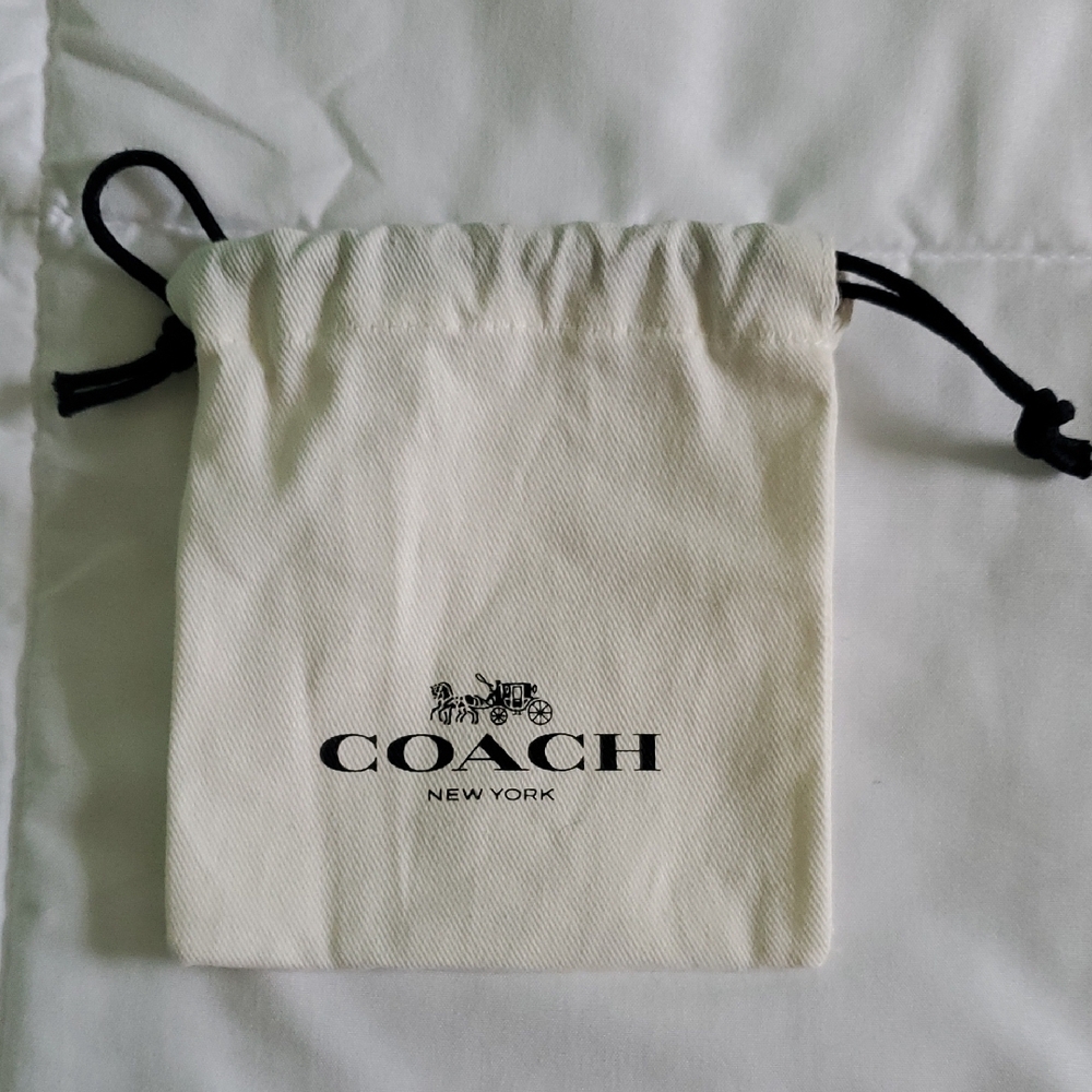 Coach Cream Drawstring Pouch